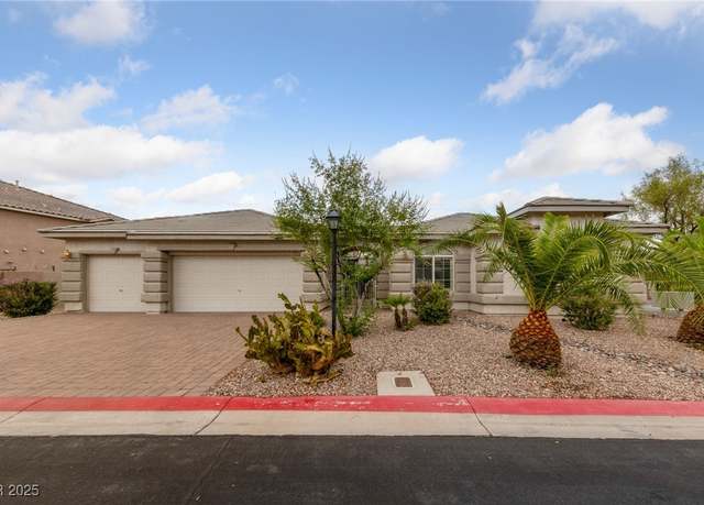 Property at 9208 Brilliant Ore Dr, Las Vegas, NV 89143, 5 beds, 3 baths