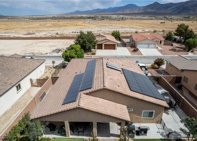 Property at 5761 E Badlands Ln, Pahrump, NV 89061, 3 beds, 2.5 baths