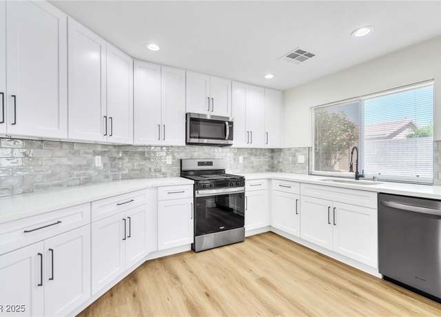 Property at 2112 Hollow Oak Ave, North Las Vegas, NV 89031, 4 beds, 2 baths