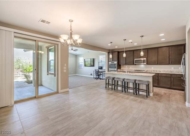 Property at 5720 Mesa Mountain Dr, Las Vegas, NV 89135, 4 beds, 3.5 baths