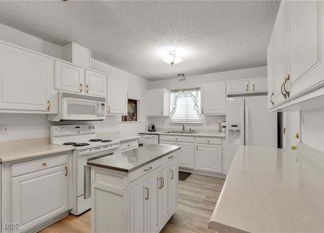 Property at 909 Biljac St, Las Vegas, NV 89145, 4 beds, 2 baths