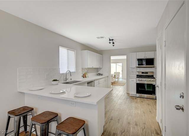 Property at 1911 Ona Marie Ave, North Las Vegas, NV 89032, 4 beds, 2 baths