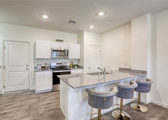 Property at 12728 Feathersong St, Henderson, NV 89044, 3 beds, 2 baths