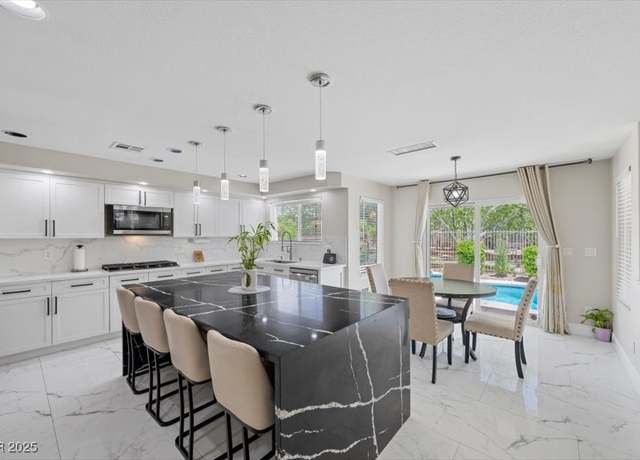 Property at 7012 Geese Gathering St, North Las Vegas, NV 89084, 5 beds, 3.5 baths