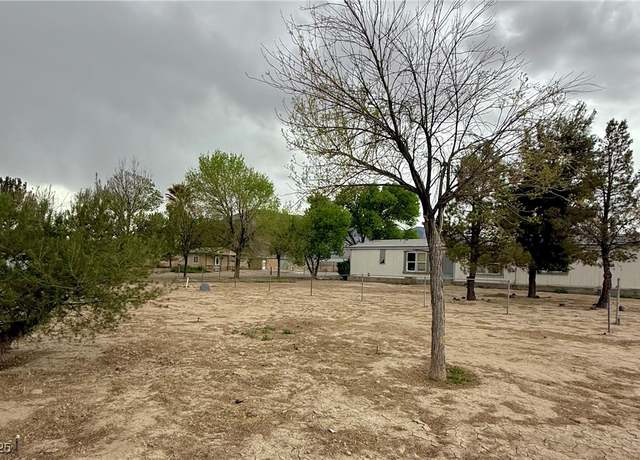 Property at 1850 W Simkins Rd, Pahrump, NV 89060, 4 beds, 2 baths