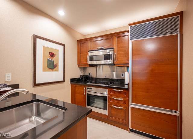 Property at 135 E Harmon Ave #414, Las Vegas, NV 89109, 1 bed, 2 baths