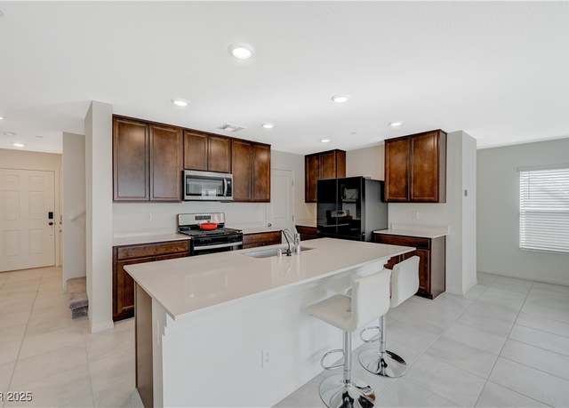 Property at 5691 Tinar St, Las Vegas, NV 89113, 3 beds, 2.5 baths