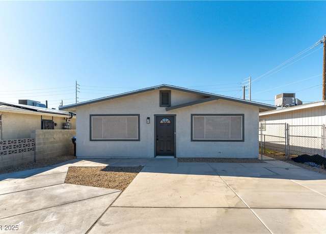 Property at 887 W Carey Ave, North Las Vegas, NV 89030, 4 beds, 2 baths