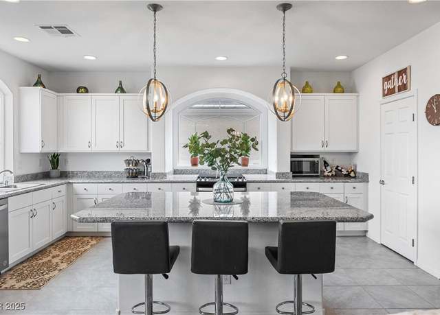 Property at 6346 Rock Strm Ln, Las Vegas, NV 89141, 5 beds, 3.5 baths