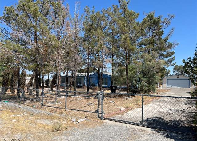 Property at 3230 E Kellogg Rd, Pahrump, NV 89061, 4 beds, 2 baths