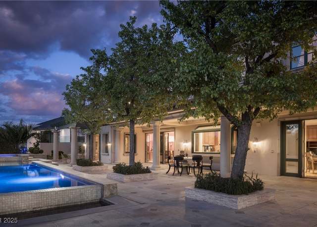 Property at 1413 Iron Hills Ln, Las Vegas, NV 89134, 5 beds, 7 baths