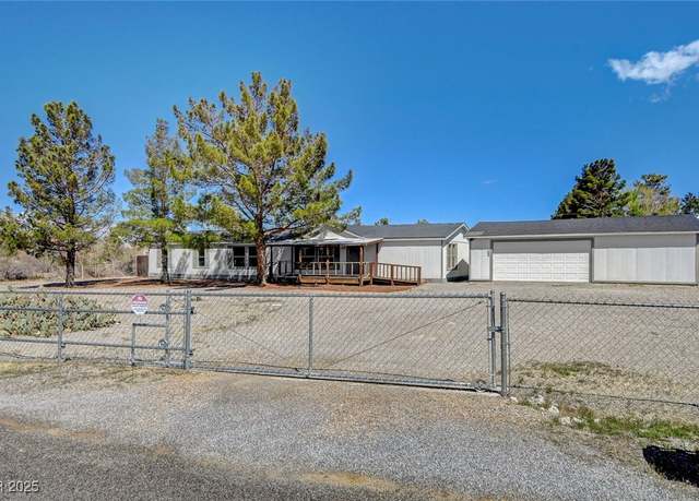 Property at 1450 W Donner St, Pahrump, NV 89048, 5 beds, 2 baths