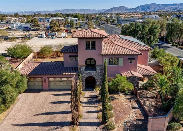 Property at 8490 Via De Bellasidra Ct, Las Vegas, NV 89123, 5 beds, 4.5 baths