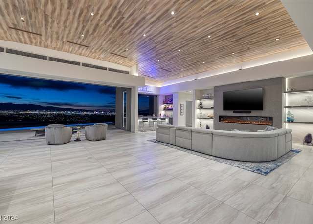 Property at 673 Falcon Cliff Ct, Henderson, NV 89012, 5 beds, 4.5 baths