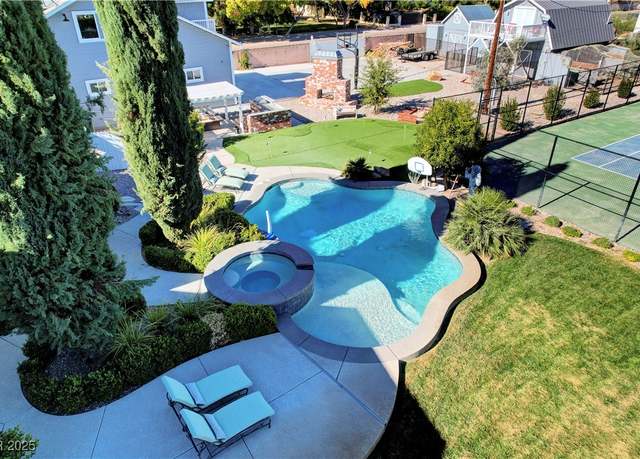 Property at 5880 W Oquendo Rd, Las Vegas, NV 89118, 6 beds, 5 baths