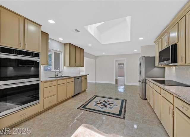 Property at 3101 Greenbriar Dr, Las Vegas, NV 89121, 5 beds, 3 baths