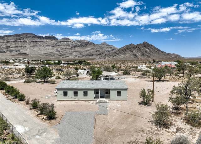 Property at 6810 Gahn Dr, Pahrump, NV 89060, 4 beds, 2 baths