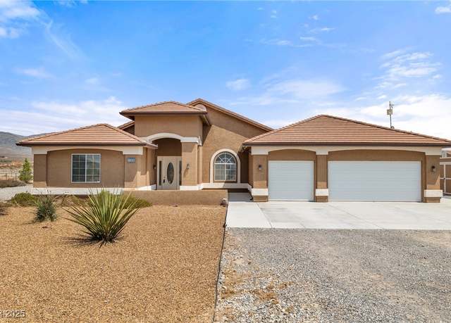 Property at 4950 W Windsong Ln, Pahrump, NV 89048, 3 beds, 2.5 baths