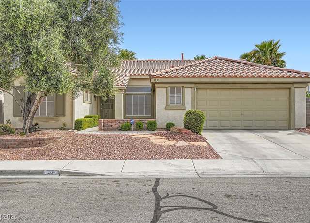 Property at 1633 Broken Feather Dr, North Las Vegas, NV 89031, 4 beds, 2 baths