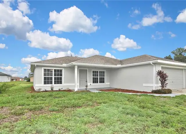 Property at 4016 35th St SW, Lehigh Acres, FL, 33976, 3 beds, 2 baths, [object Object]