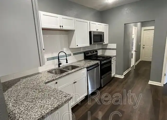 Property at 4119 Oak St Unit A, Kansas City, MO, 64111, 3 beds, 2 baths, [object Object]