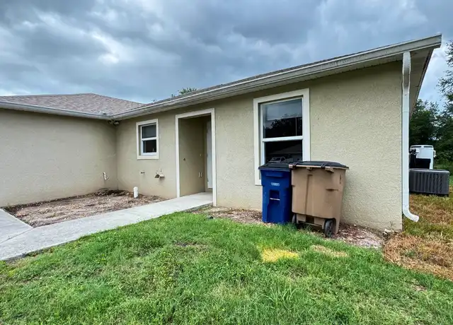 Property at 4424 29th St SW, Lehigh Acres, FL, 33973, 3 beds, 2 baths, [object Object]