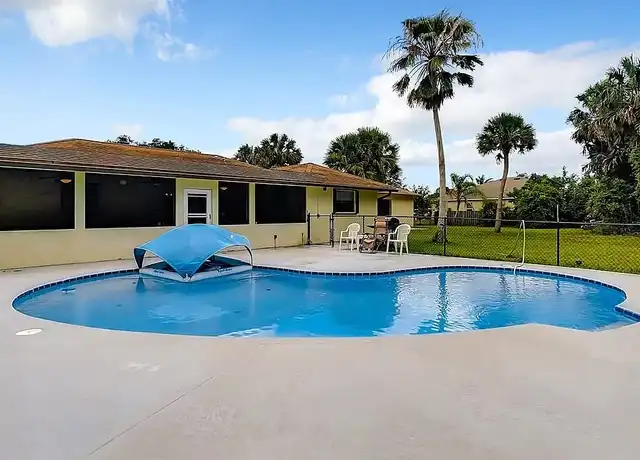 Property at 1914 SW Flower Ln, Port Saint Lucie, FL, 34953, 4 beds, 2 baths, [object Object]