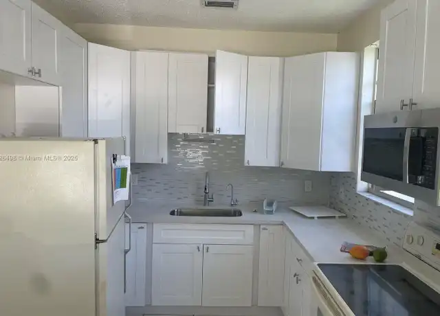 Property at 907 SW 8th St Unit 1-2, Hallandale Beach, FL, 33009, 3 beds, 2 baths, [object Object]