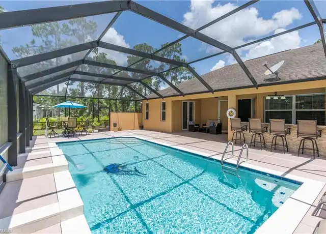 Property at 2960 10th Ave NE, Naples, FL, 34120, 4 beds, 3 baths, [object Object]