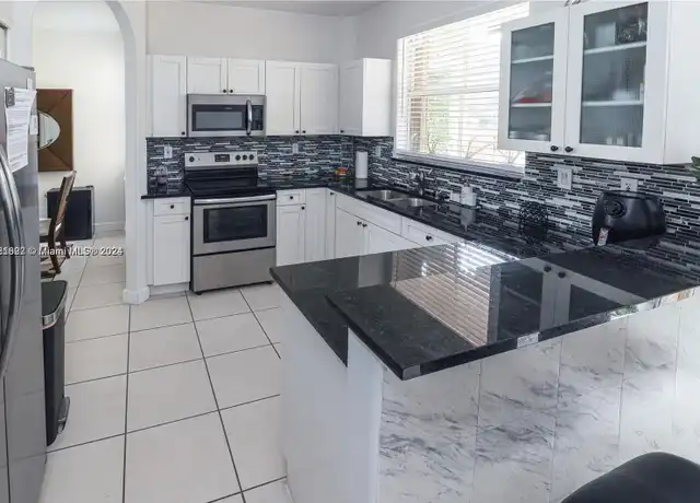Property at 4866 NW 108th Psge Unit 4866, Doral, FL, 33178, 4 beds, 2.5 baths, [object Object]
