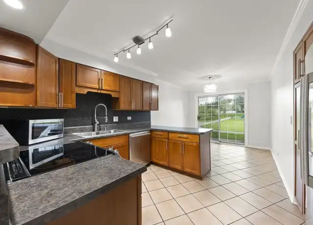 Property at 1338 S Lorraine Rd Unit D, Wheaton, IL, 60189, 2 beds, 1.5 baths, [object Object]