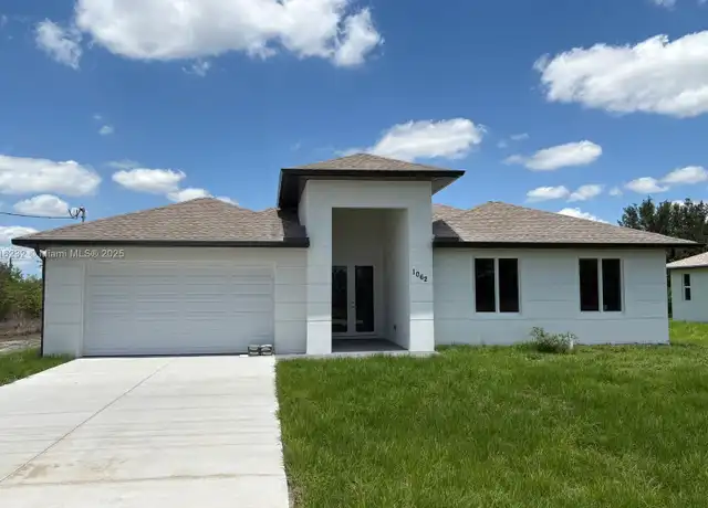 Property at 1062 Bell Blvd Unit 1062, Lehigh Acres, FL, 33974, 3 beds, 2.5 baths, [object Object]