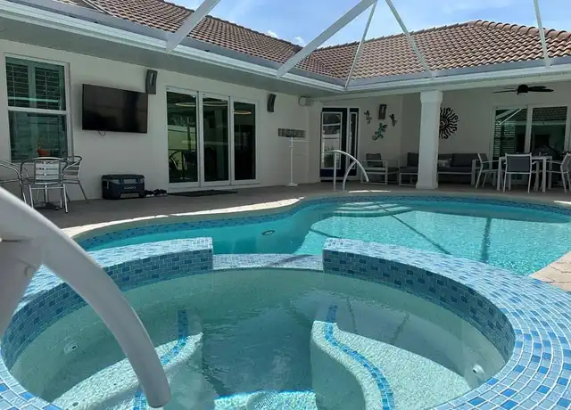 Property at 1595 Whispering Oaks Cir, Naples, FL, 34110, 3 beds, 3.5 baths, [object Object]