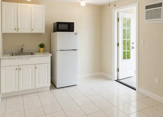 Property at 2810 NW 51st St Unit C, Miami, FL, 33142, 0 beds, 1 bath, [object Object]