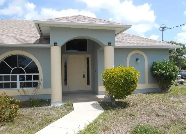Property at 407 Chamonix Ave S, Lehigh Acres, FL, 33974, 3 beds, 2 baths, [object Object]