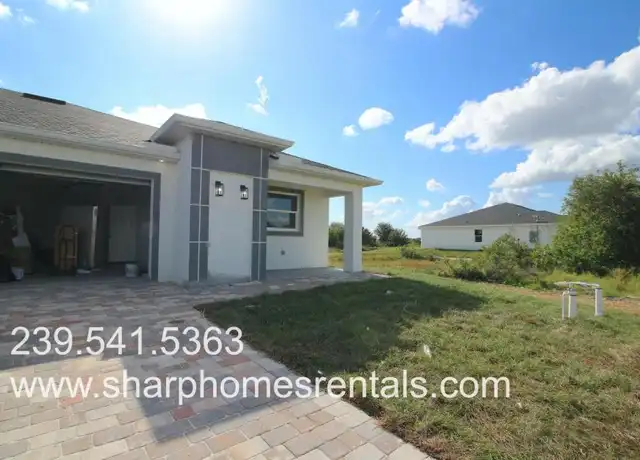 Property at 440 Grant Blvd, Lehigh Acres, FL, 33974, 3 beds, 2 baths, [object Object]