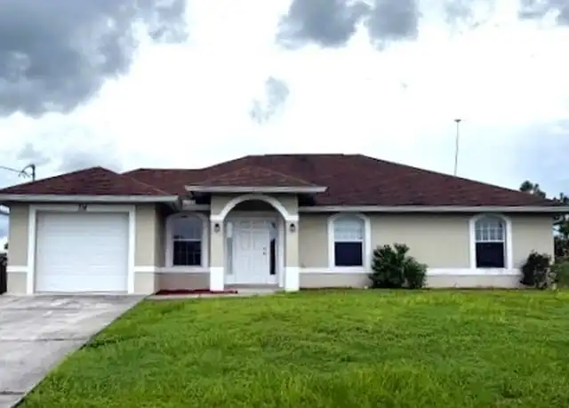 Property at 714 Cardinal St E, Lehigh Acres, FL, 33974, 3 beds, 2 baths, [object Object]