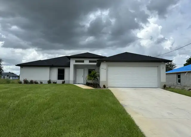 Property at 2710 28th St SW, Lehigh Acres, FL, 33976, 4 beds, 2 baths, [object Object]