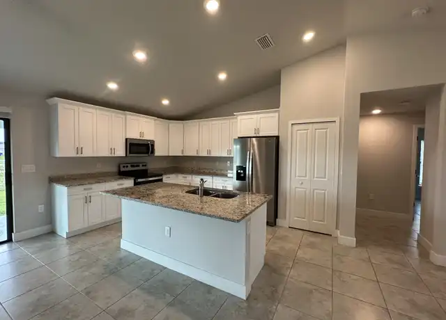 Property at 2710 28th St SW, Lehigh Acres, FL, 33976, 4 beds, 2 baths, [object Object]