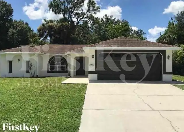 Property at 704 E 3rd St, Lehigh Acres, FL, 33936, 3 beds, 2 baths, [object Object]