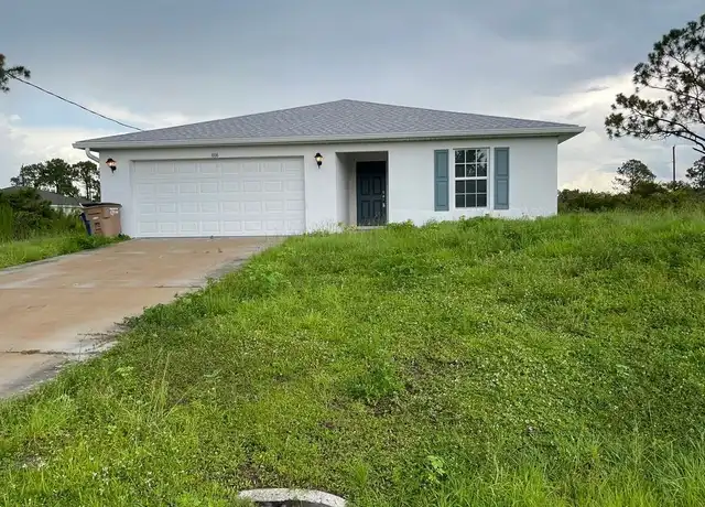 Property at 3108 64th St W, Lehigh Acres, FL, 33971, 3 beds, 2 baths, [object Object]