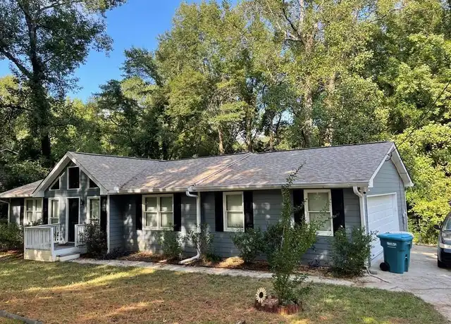 Property at 1056 Oak Rd SW, Lilburn, GA, 30047, 3 beds, 2 baths, [object Object]
