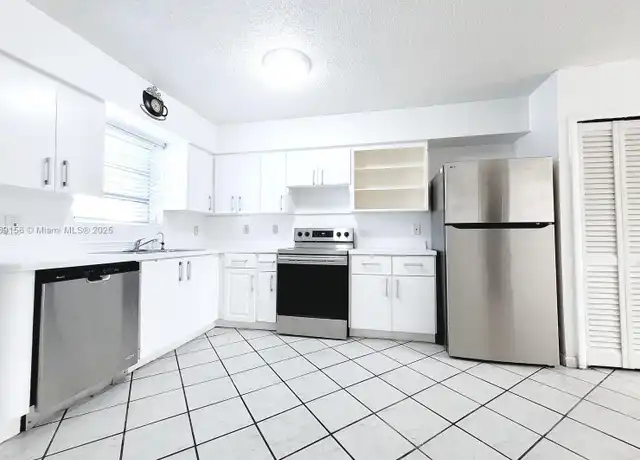 Property at 14002 NE 6th Ave, North Miami, FL, 33161, 5 beds, 3 baths, [object Object]