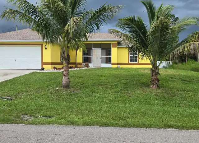 Property at 703 W 7th St, Lehigh Acres, FL, 33972, 3 beds, 2 baths, [object Object]