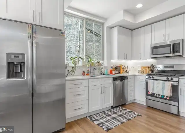Property at 1356 S Bouvier St Unit 1, Philadelphia, PA, 19146, 3 beds, 2 baths, [object Object]