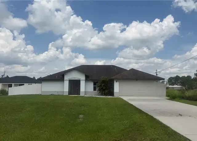 Property at 833 Eisenhower Blvd, Lehigh Acres, FL, 33974, 3 beds, 2 baths, [object Object]