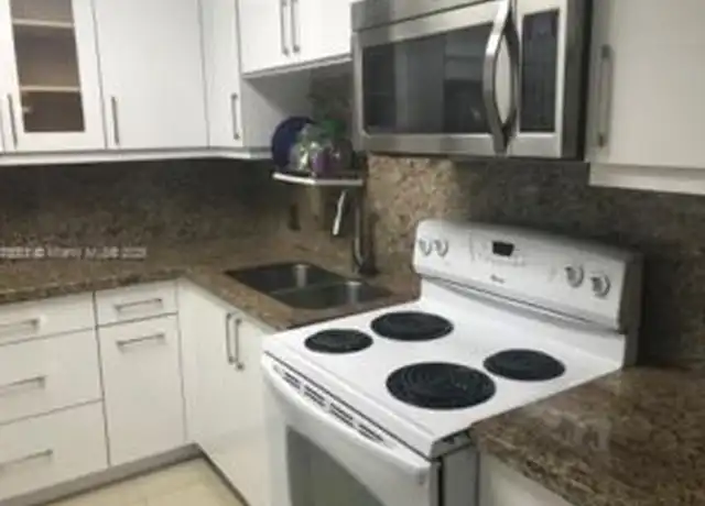 Property at 3401 N Country Club Dr #219, Miami, FL, 33180, 2 beds, 2 baths, [object Object]