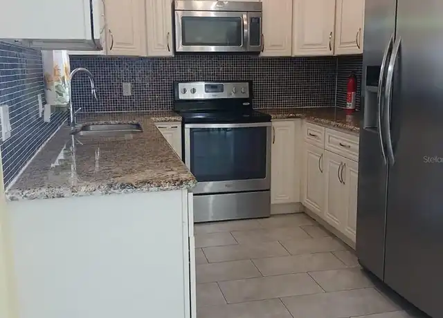 Property at 9804 N 53rd St, Temple Terrace, FL, 33617, 3 beds, 2 baths, [object Object]