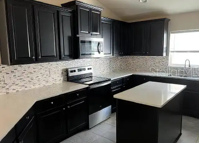 Property at 424 Buchannan Dr, Davenport, FL, 33837, 4 beds, 3 baths, [object Object]