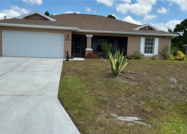 Property at 3204 31st St W, Lehigh Acres, FL, 33971, 3 beds, 2 baths, [object Object]